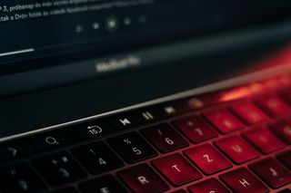 Low-light laptop keyboard — photo by Szabó Viktor on Pexels