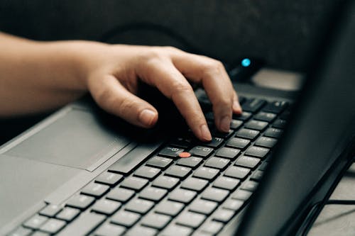 Person Using Black Laptop Computer