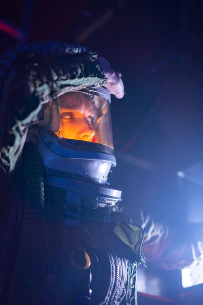 Pilot in a lit visor — photo by Mikhail Nilov on Pexels