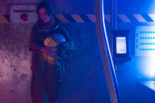 Free A woman in a spacesuit stands inside a spacecraft, highlighting space exploration themes. Stock Photo