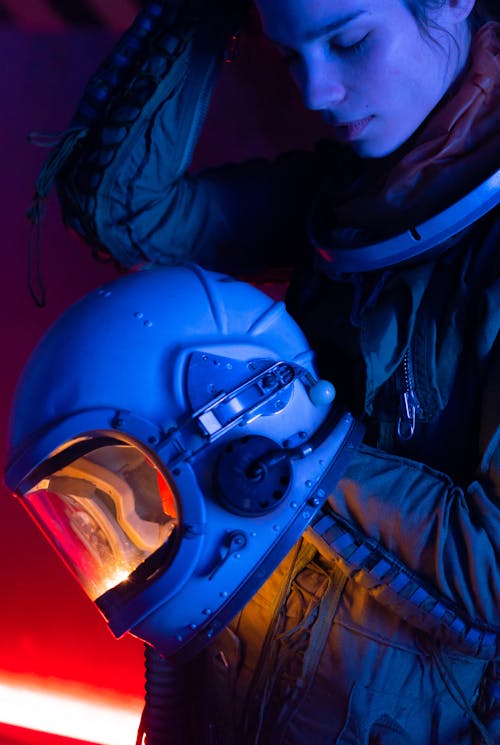 Woman Wearing A Spacesuit With Helmet