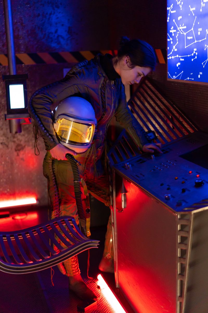 Female astronaut operating a control panel in a spaceship, exploring outer space.