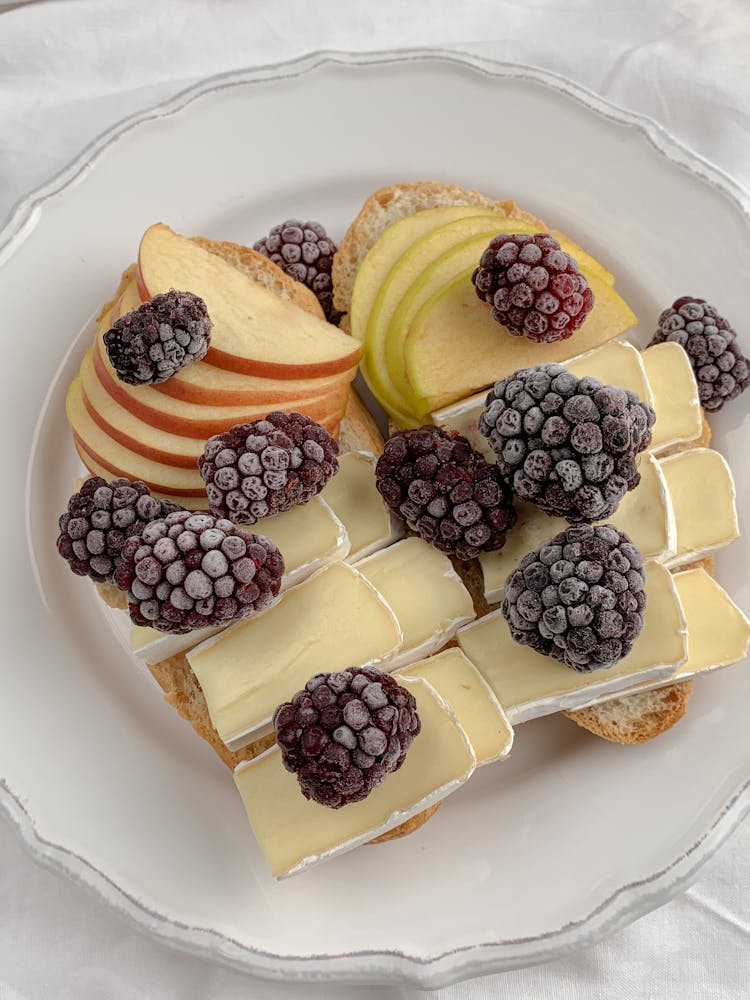 Bread With Slices Of Apple And Berries On Top