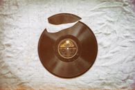 Close-Up Photo of a Broken Vinyl Record