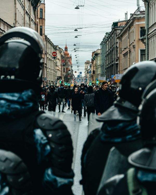 Crowd behind Police Officers · Free Stock Photo