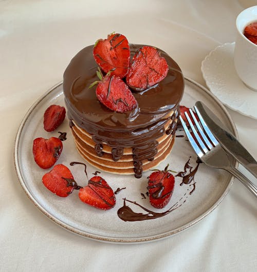 Pancakes with Chocolate Syrup and Straberries