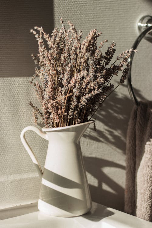 Decorative Plants in White Ceramic Vase