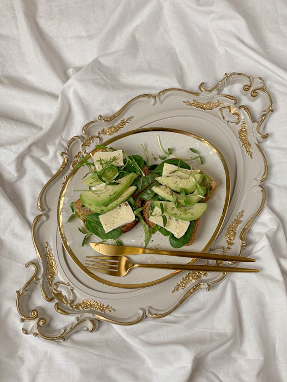 Free Healthy Avocado Toasts on a Vintage Serving Tray Stock Photo