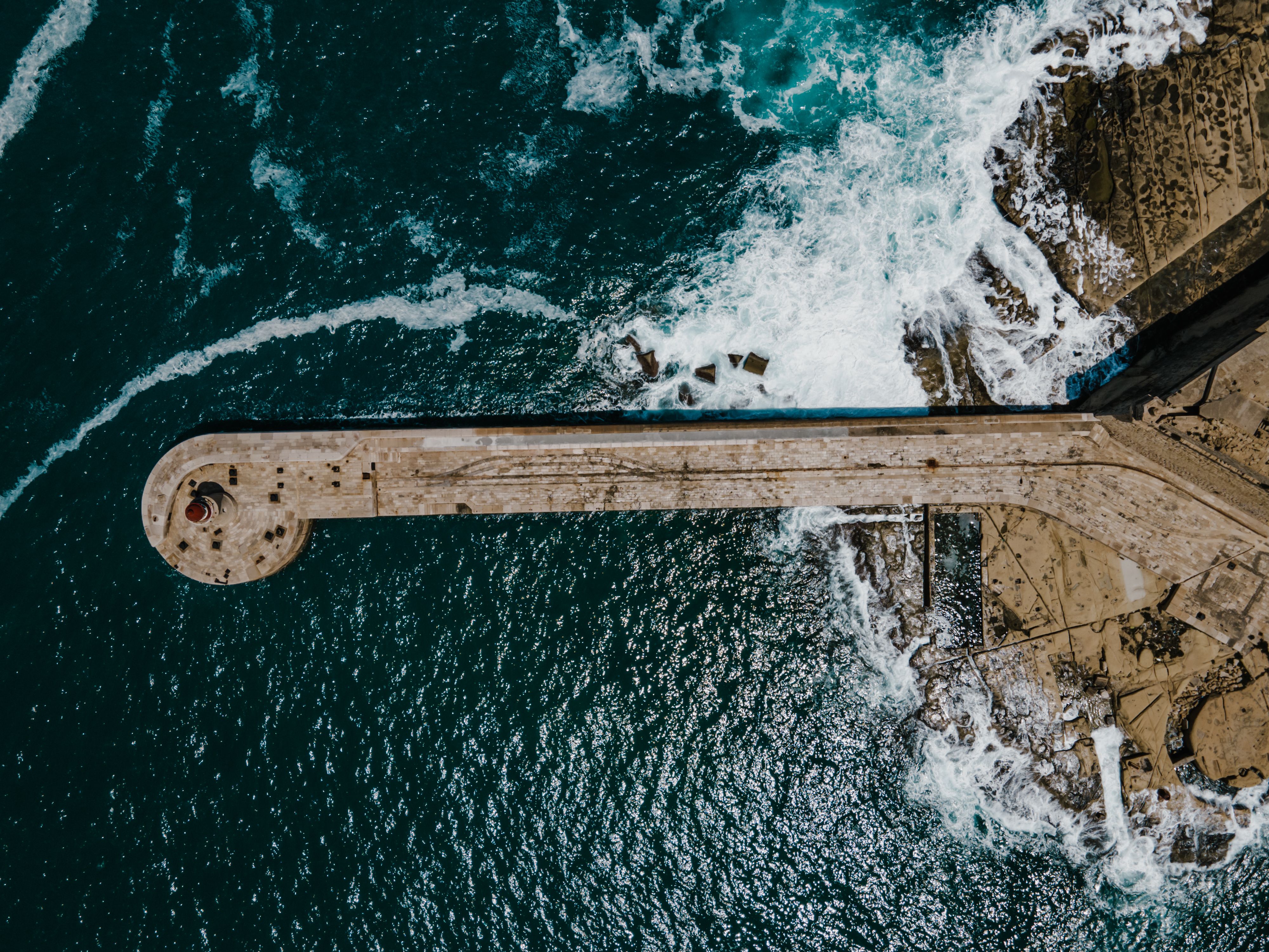 Aerial View of Sea Waves Crashing on Shore · Free Stock Photo