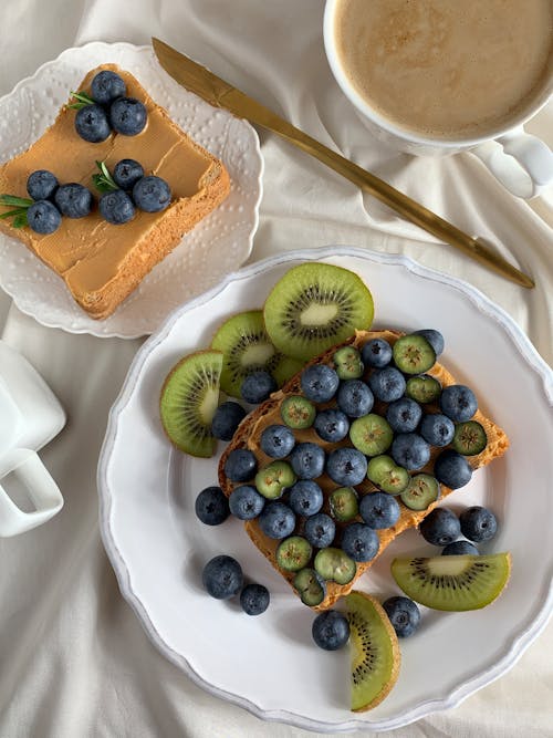 Free Toast with Fresh Berries on a Ceramic Plate Stock Photo