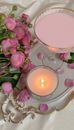 Pink Candle on White Ceramic Saucer