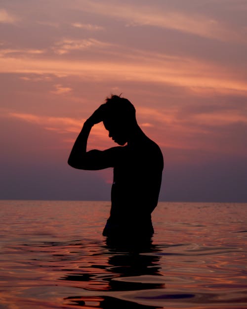 Silhouette of a Man at the Sea