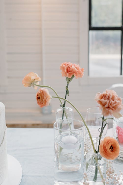 Pink Flowers in Clear Glass Vases