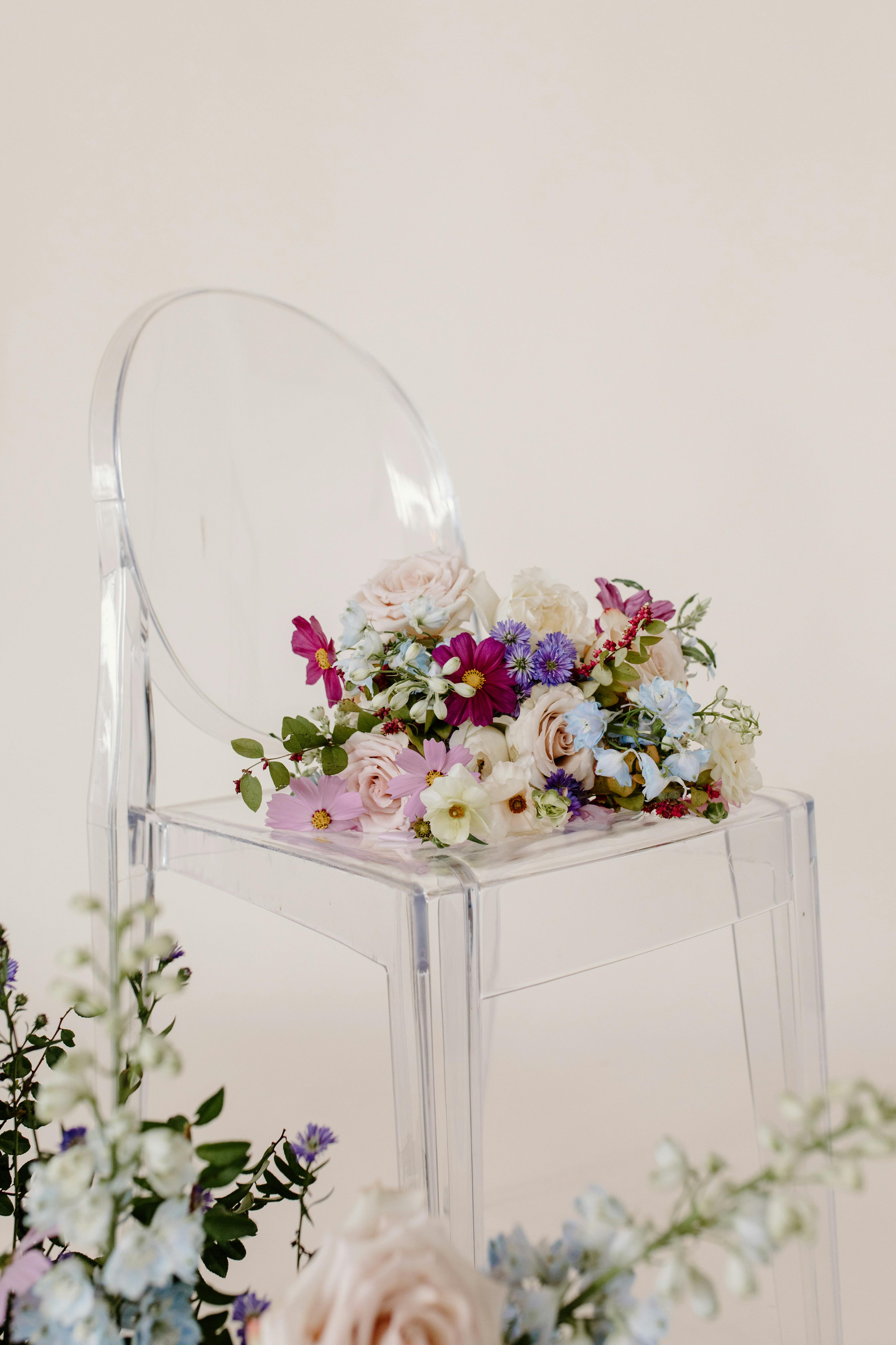 Pink and White Flowers in Clear Glass Vase