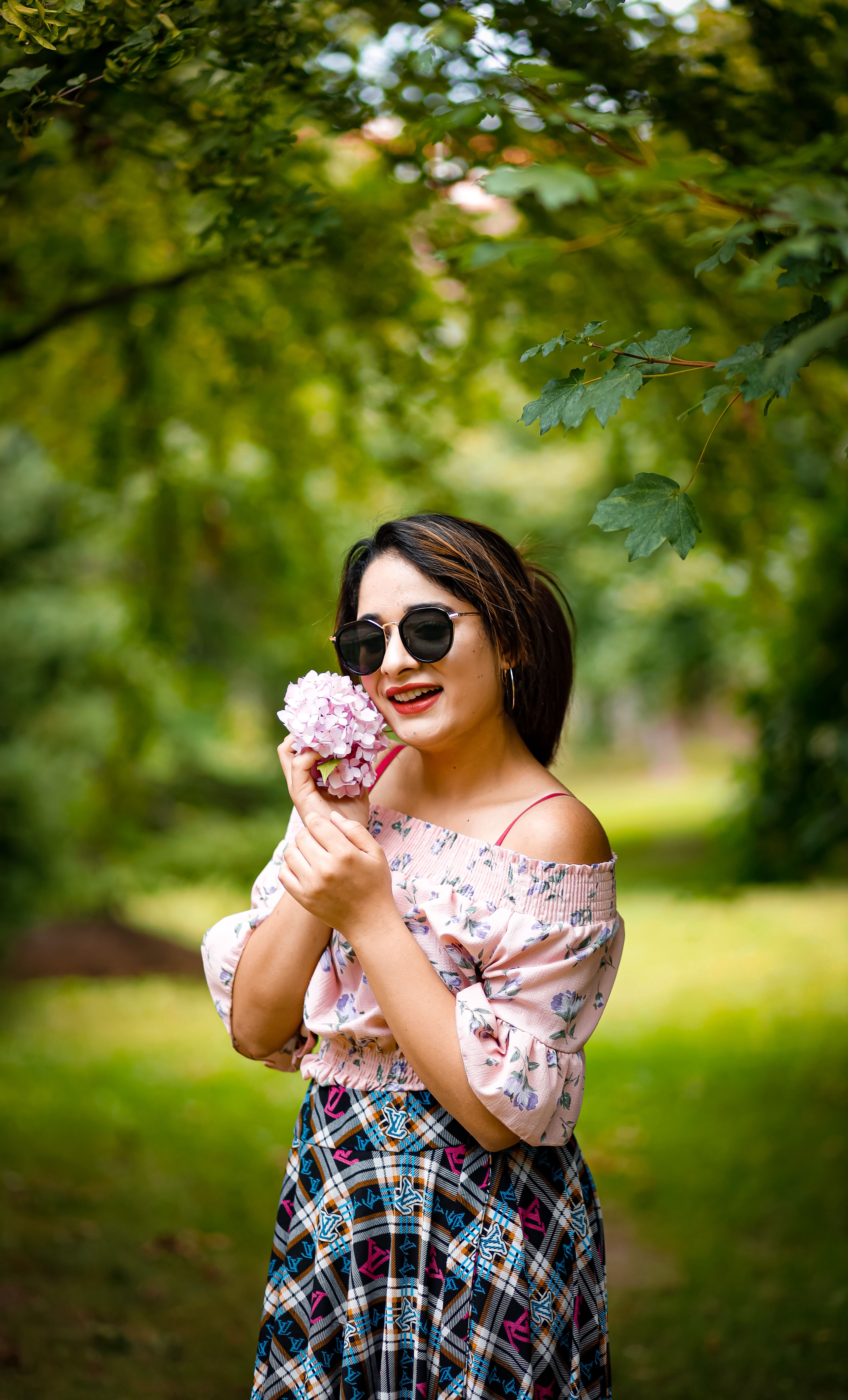 Woman in White Floral Top · Free Stock Photo