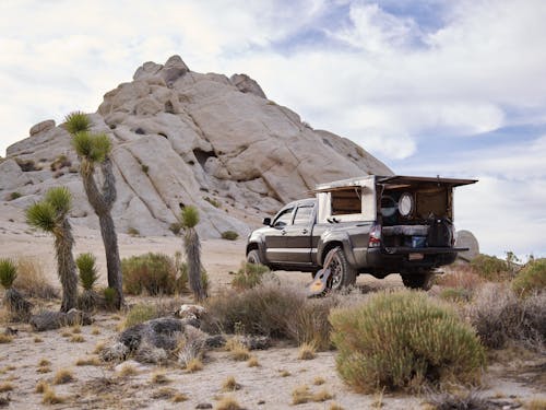 Free Truck Camper Neat Brown Rock Formation Stock Photo