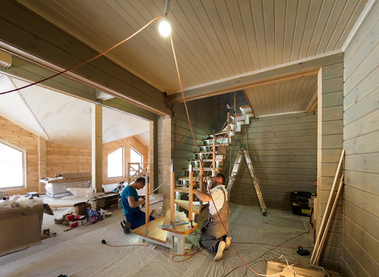 Carpenters Building A Staircase