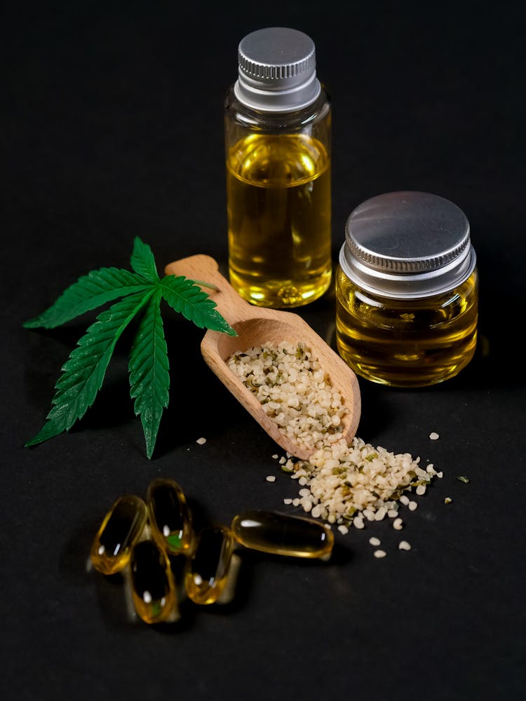 Photo Of Cannabis Oil On A Clear Plastic Jar