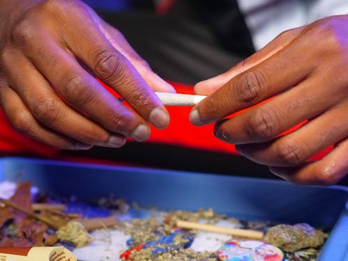 Close-Up Photo of Making of Weed Blunt