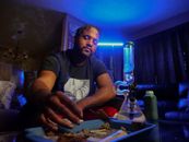 Photo of Man Staying in a Dark Room