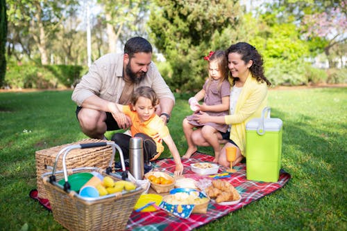 Photo of a Family Having a Picnic