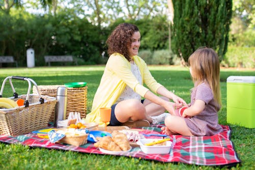 Mother and Daughter Having a Picnic