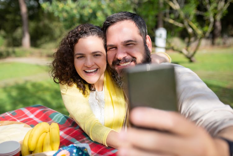 Man Taking Selfie With A Woman