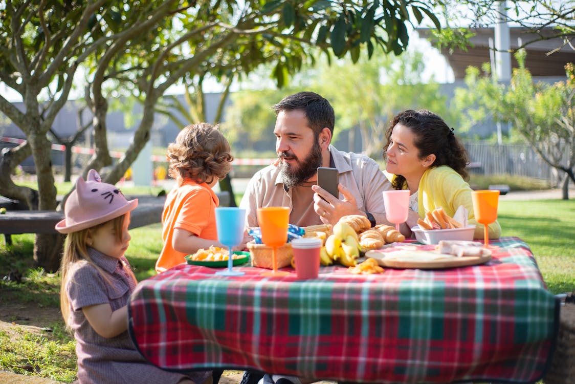 Bearded Man Talking to Children