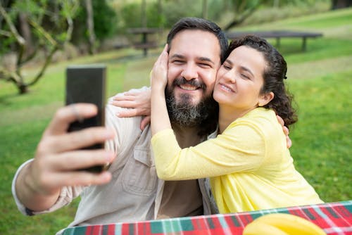 Free Bearded Man Taking Selfie with a Woman Stock Photo