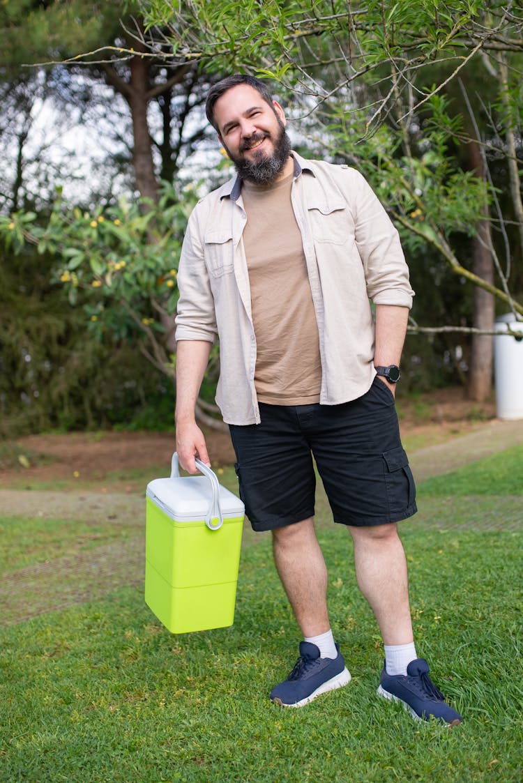 Bearded Man Holding A Cooler