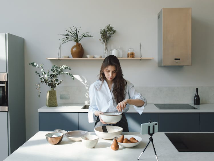 A Food Vlogger Recording A Video