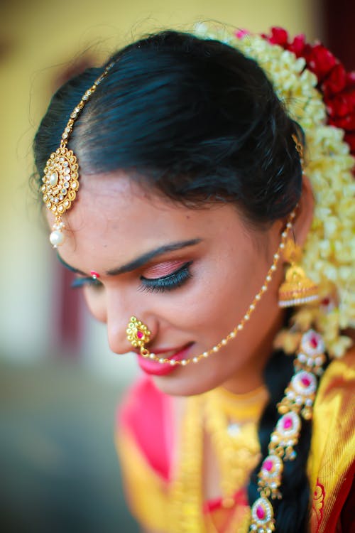 Woman in Nose Piercing and Head Jewelry