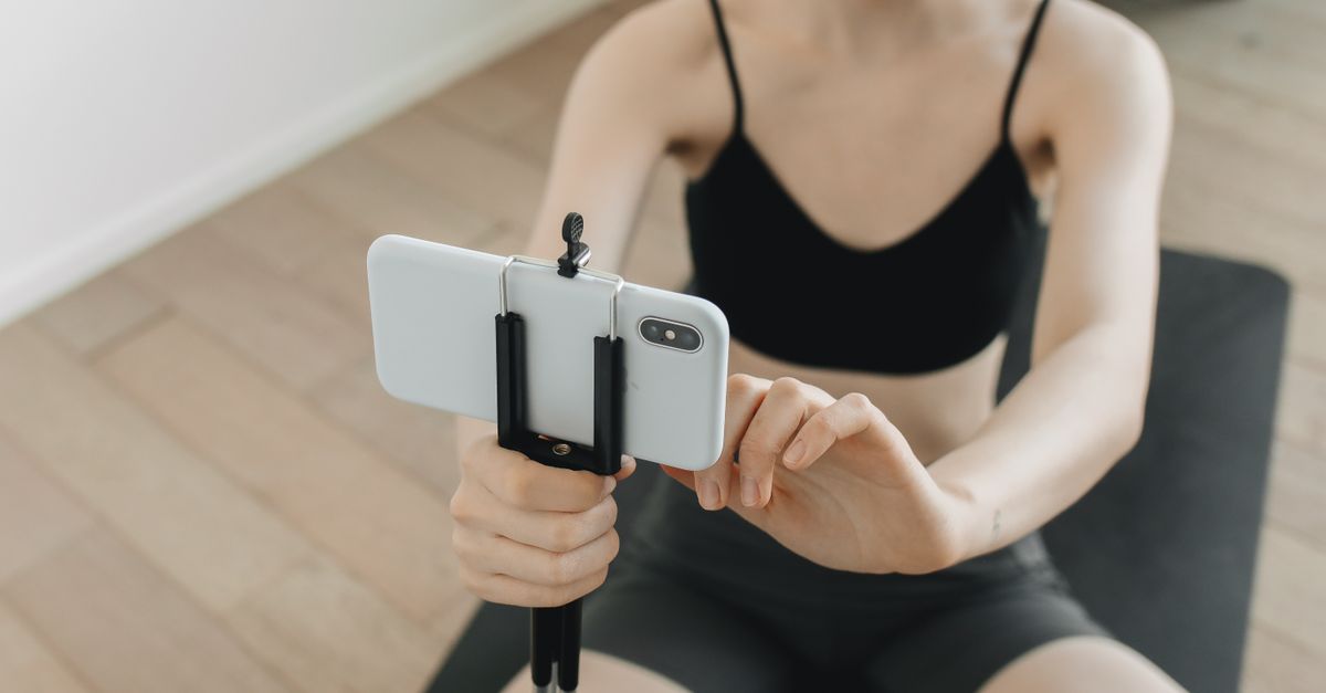young college athlete filming social media content for brand sponsorship