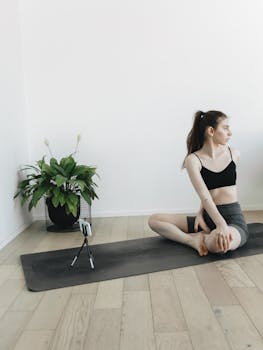 A woman doing yoga indoors, captured with Canon EOS 5D Mark IV.