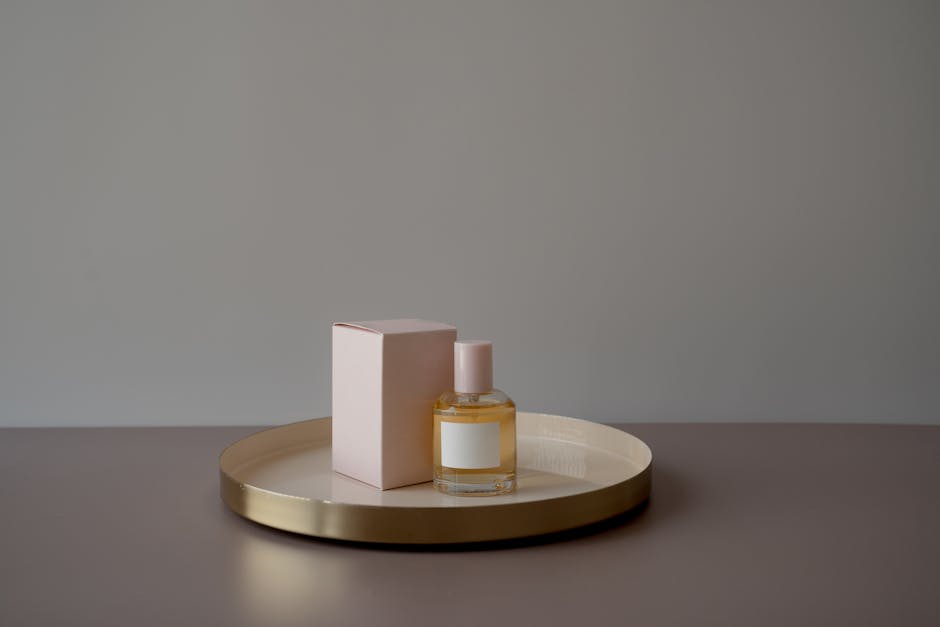 Elegant minimalist perfume bottle on a tray with neutral background, perfect for luxury and lifestyle themes.