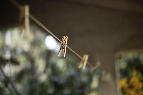 Selective Focus Photography of Clothes Hanger Clip