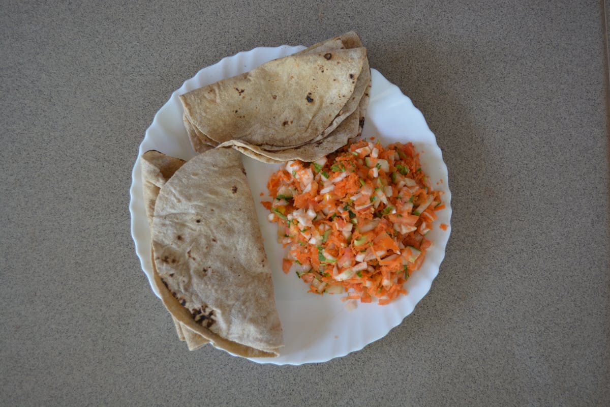 Plus-size power dressing outfit with a structured blazer and tailored trousers in a monochrome palette
