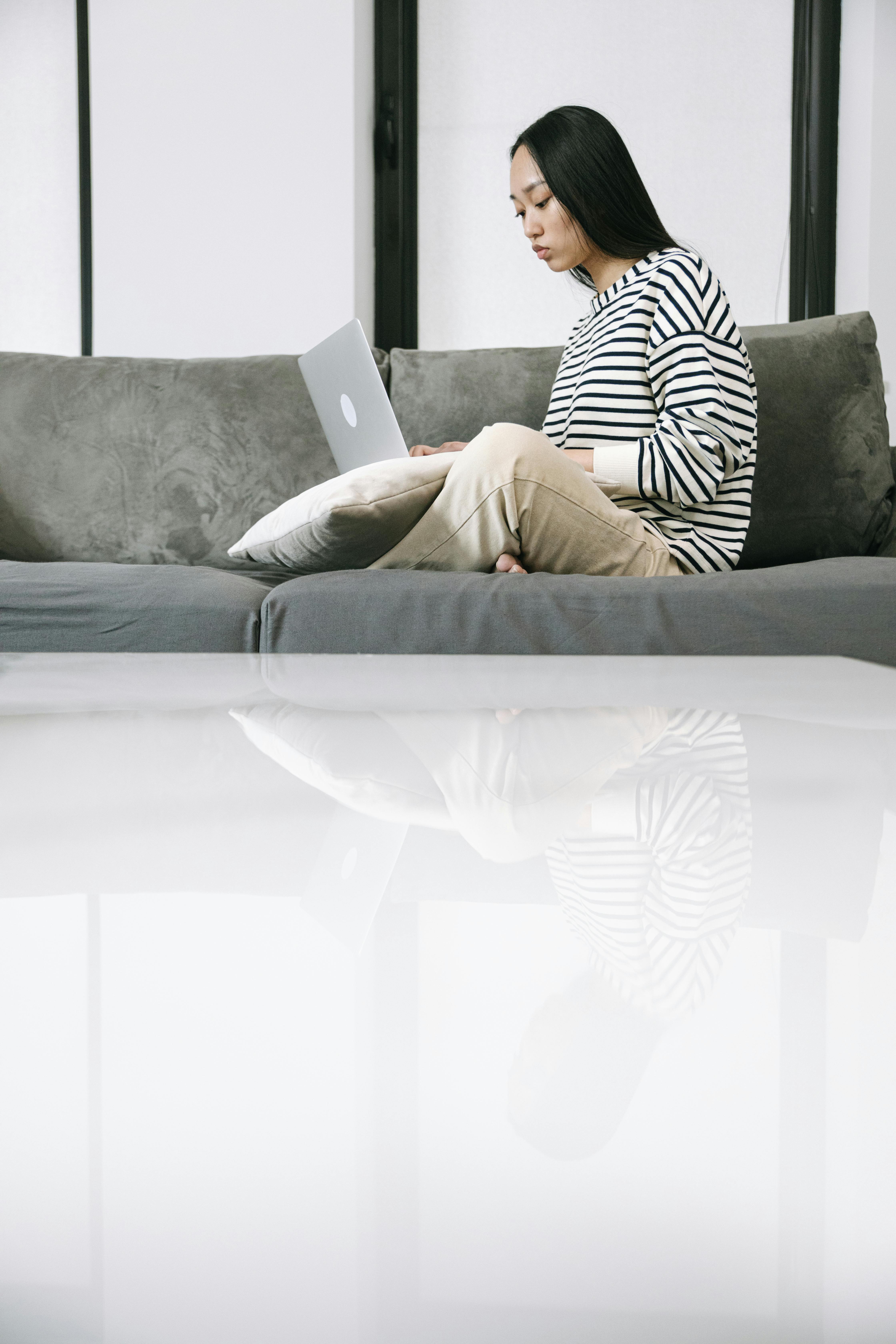 Clothing rack with denim jackets and jeans in a retail store