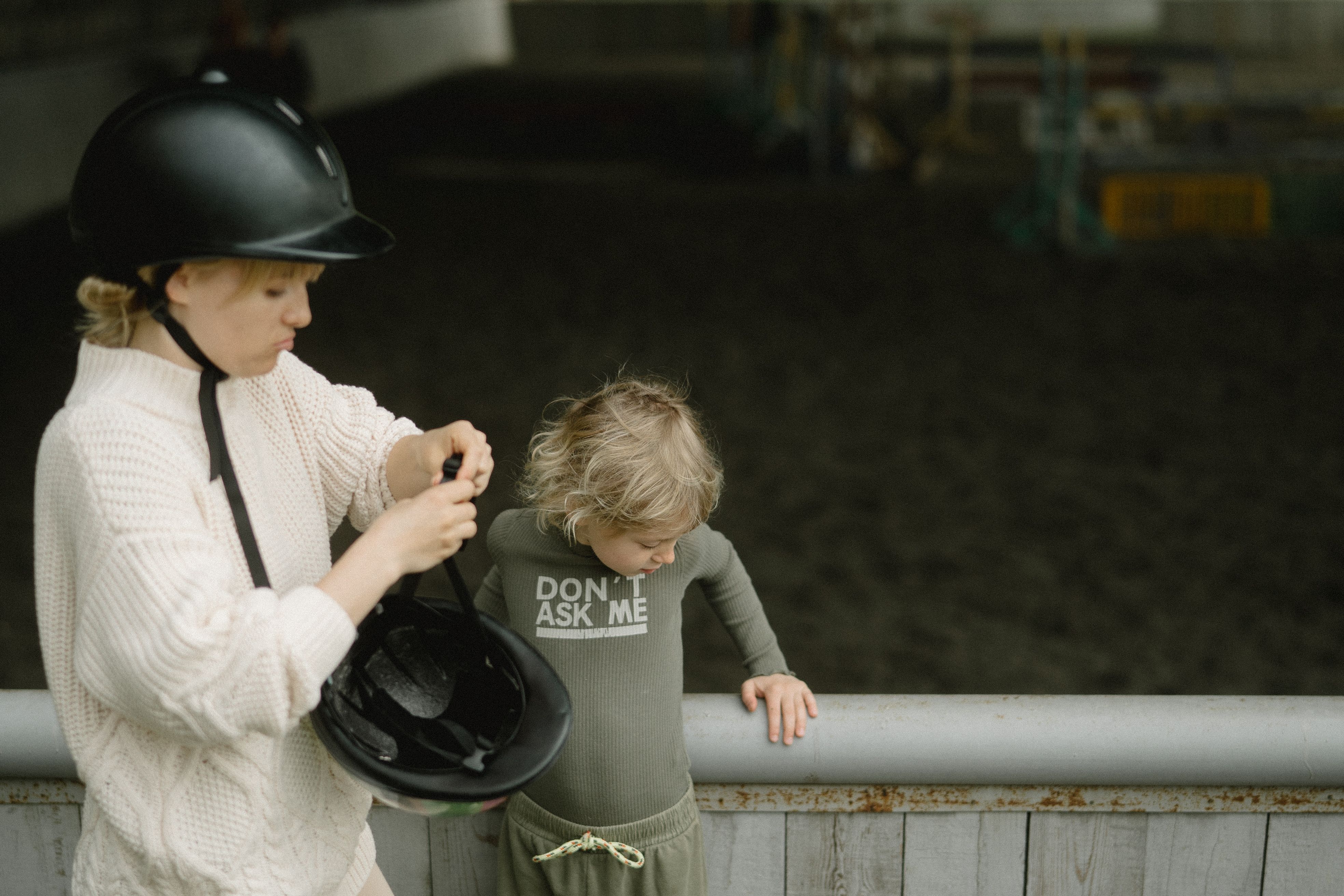 Mother and Child Standing Beside the Stable · Free Stock Photo