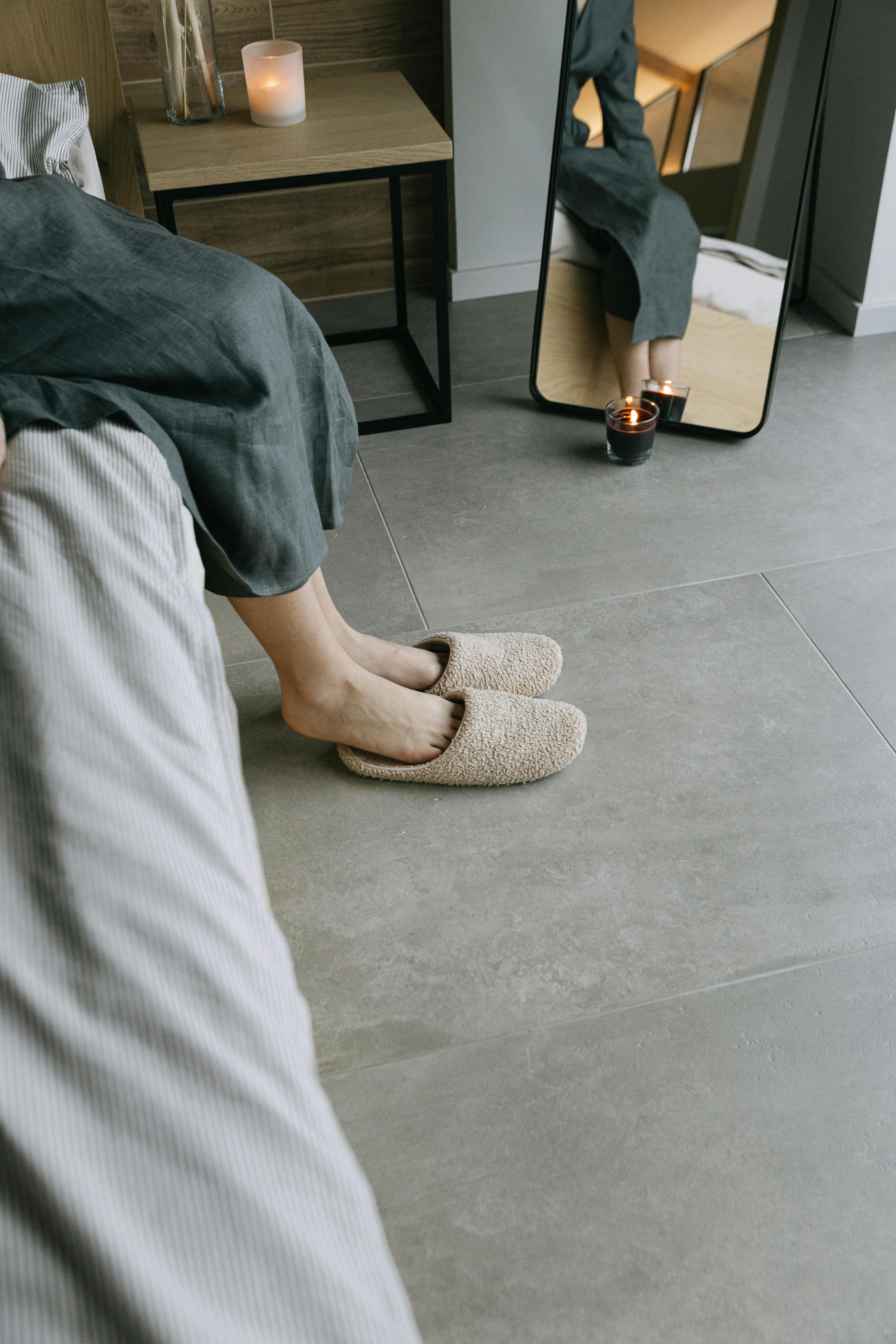 a person wearing an indoor slippers
