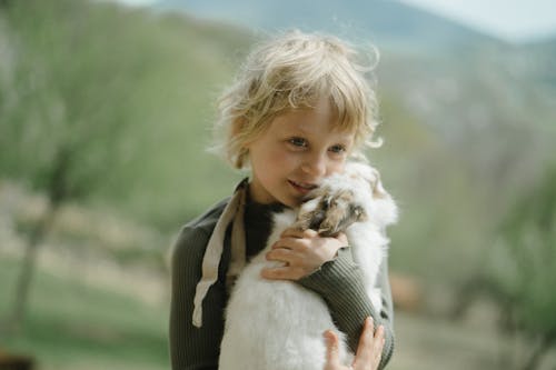 Boy Holding a Bunny