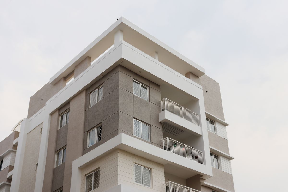 Apartment building exterior suitable for rental and investment marketing