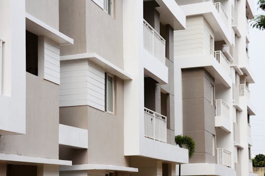 A modern apartment building exterior with balconies in Hyderabad, India.