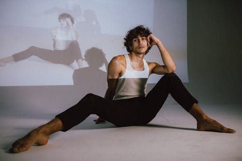 Male Dancer Sitting On Floor