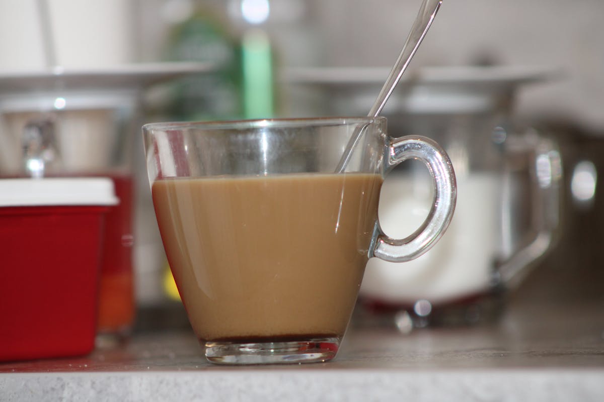 Music producer working at a laptop with audio interface