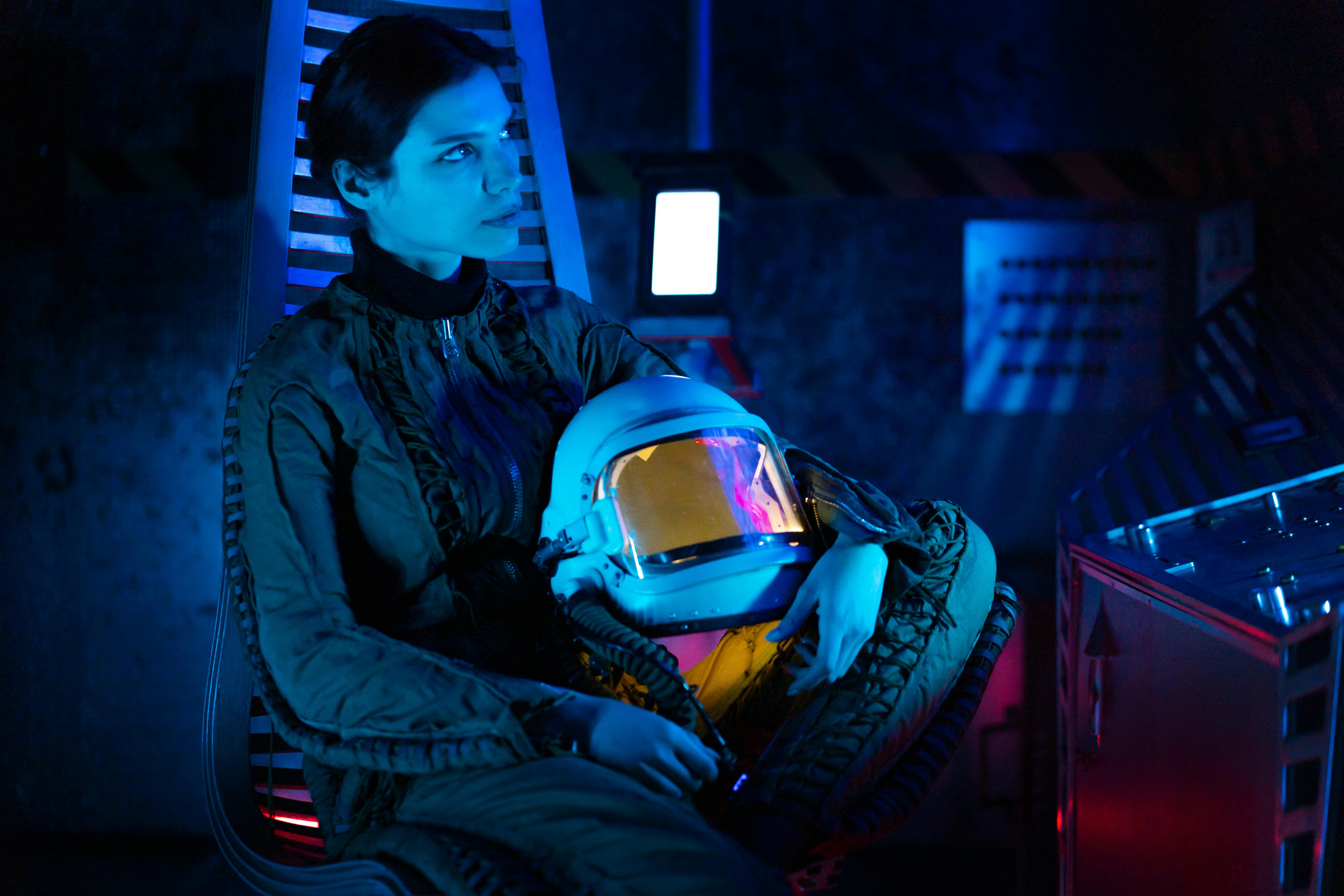 woman in a spacesuit with a helmet