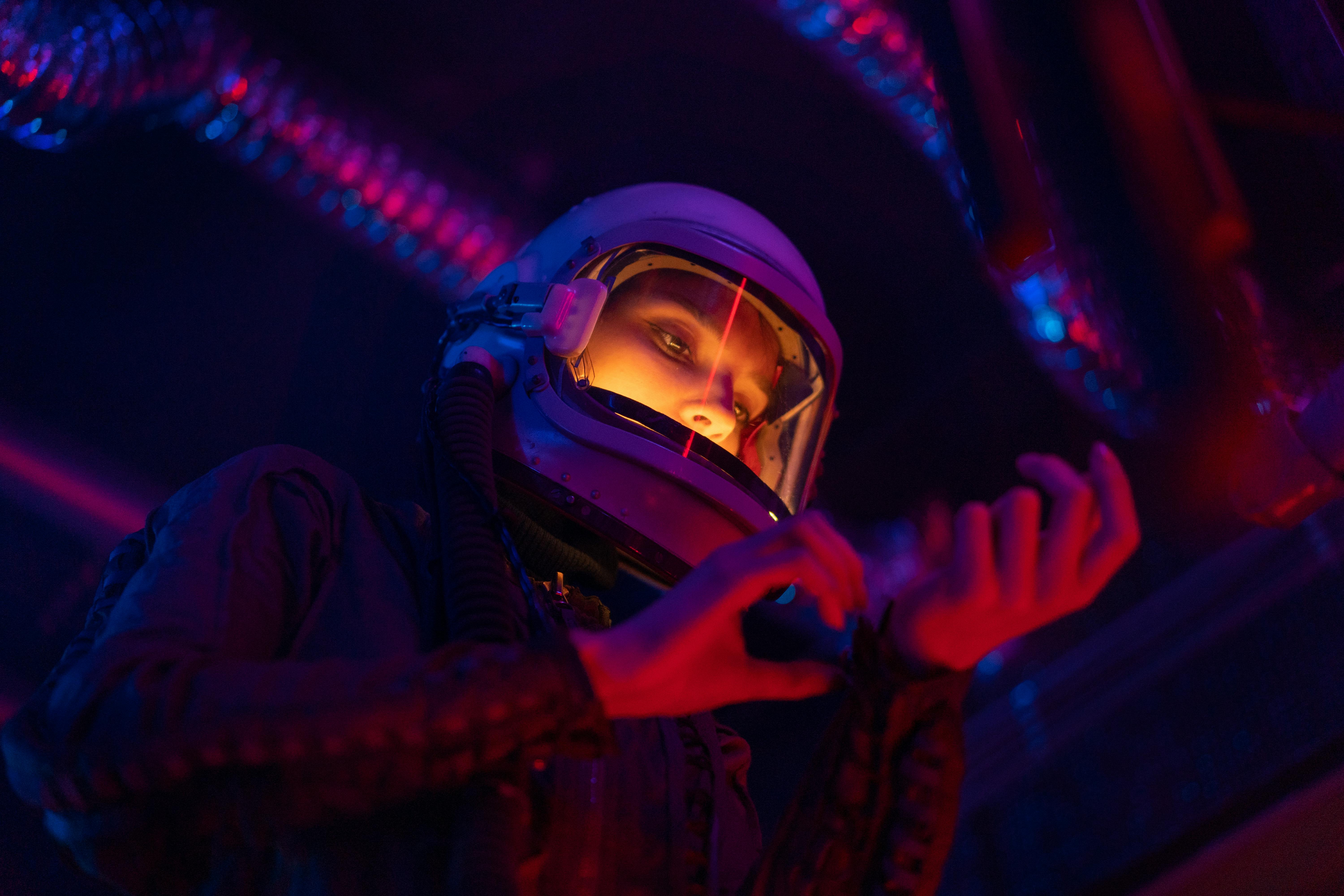 woman in spacesuit with light reflections