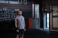 Man in Gray Tank Top and Black Shorts