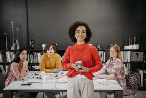Free A diverse group of colleagues in a modern office collaborating and planning together. Stock Photo