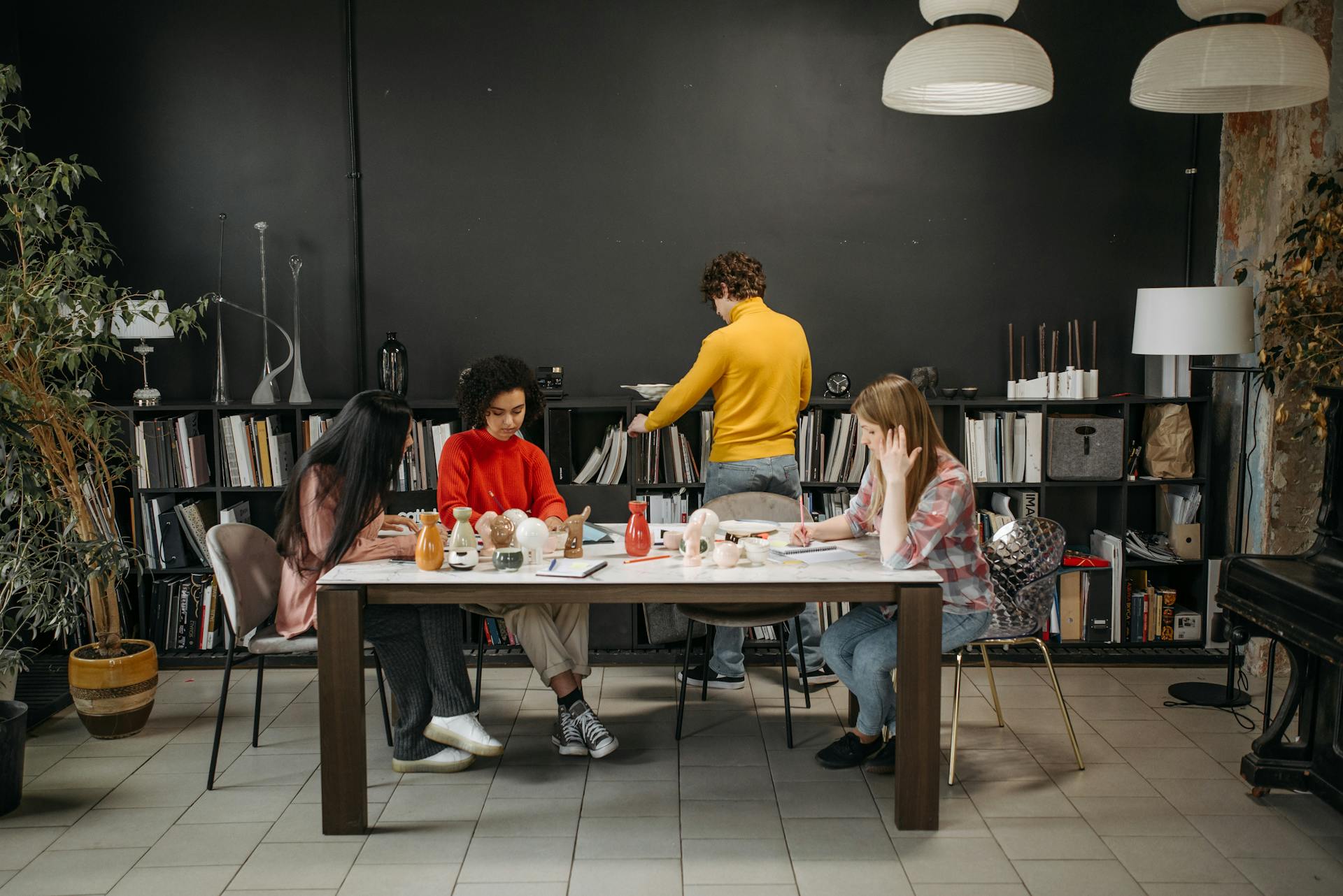 A Group of People Having a Meeting in the Office